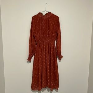 Rust colored patterned dress, women’s size XL, only worn once.